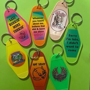 7 fun double sided motel keychains